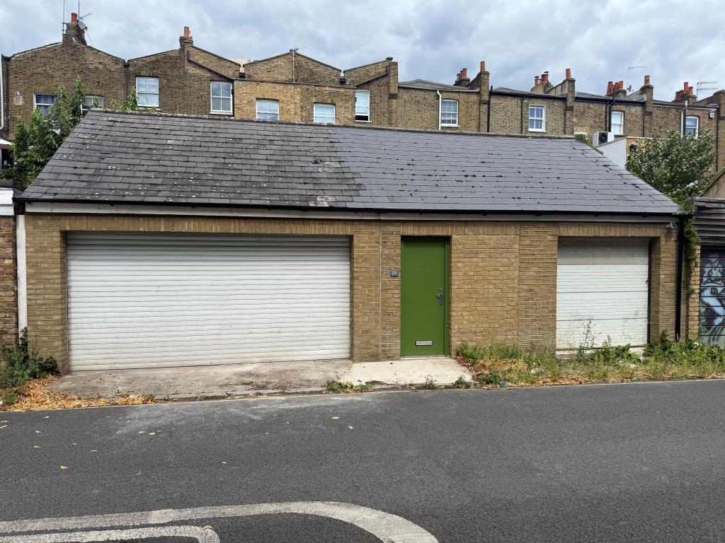 Lot: 21 - FREEHOLD GARAGE/WORKSHOP OF APPROXIMATELY 700 SQ.FT - View of garage from Oval Place